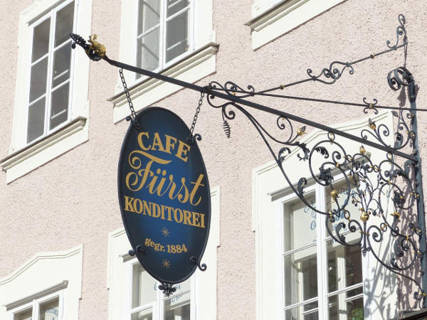 A hanging cafe sign